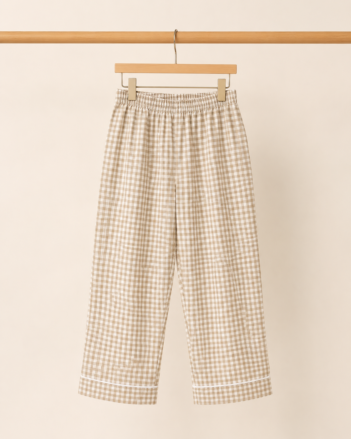 Boys beige gingham check pyjama trousers - front view on hanger