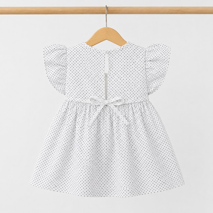 Baby girl wearing white polka dot floral embroidered dress and bloomer set