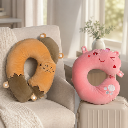 Kids Adults Pink Love Bear & Brown Sleepy Dino Plush U-Shape Neck Travel Pillows - Both Pillows on Sofa & Luggage Lifestyle Shot
